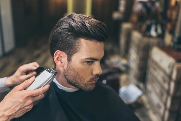 depositphotos 161543532 stock photo barber cutting hair of customer